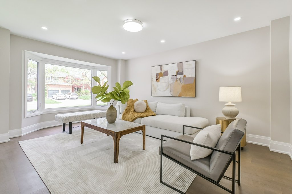 Modern living room staged with yellow accent furnishings